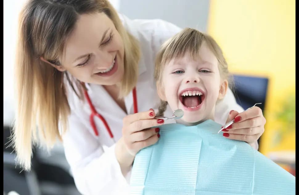 Dentist treating a young patient
